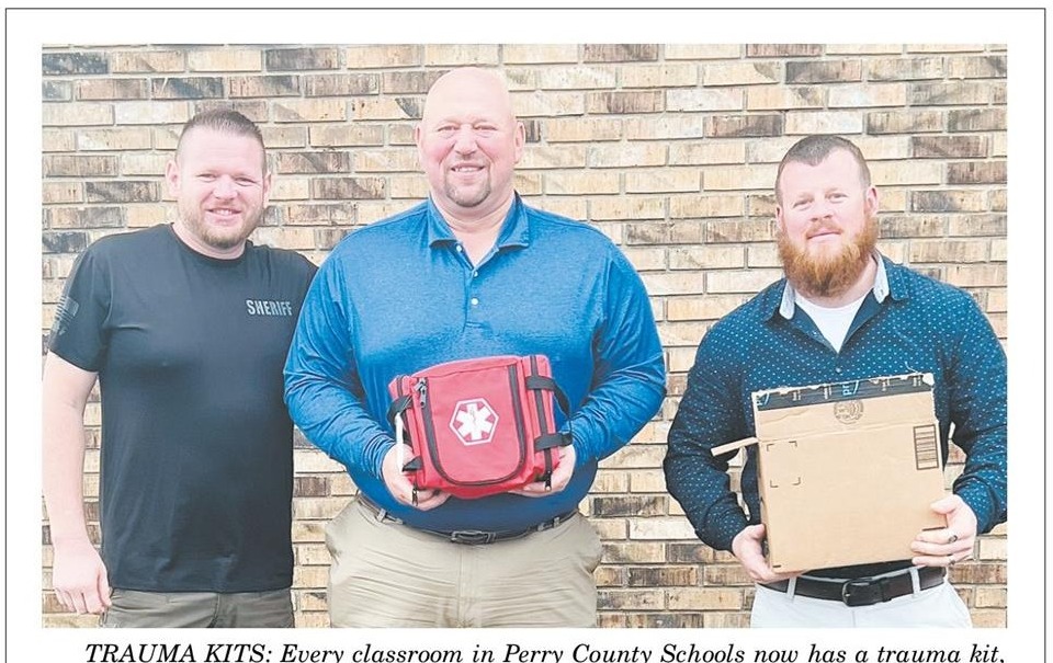 Every classroom in Perry County Schools now has a trauma kit, thanks to donations from local businesses and individuals.  Pictured:  Sheriff Nick Weems, Director of Schools Eric Lomax, and Warrior Vets Medical Services partner Buddy Lunati.